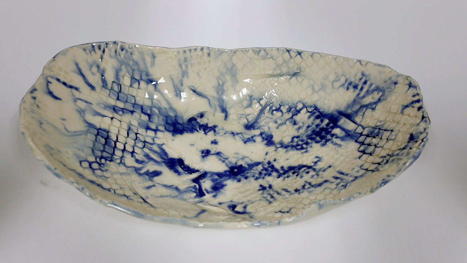 Sculpture “Cream & Sapphire Dish” by Dina Egar.