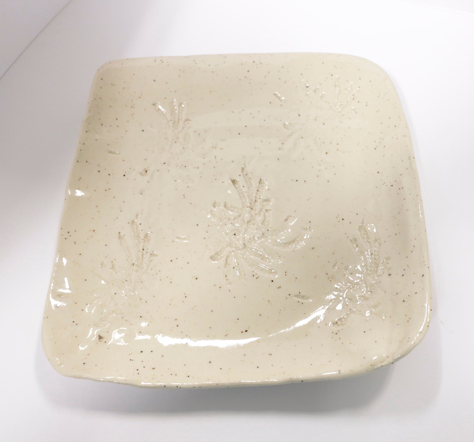 Sculpture “Spider Lily Square Plate” by Dina Egar.