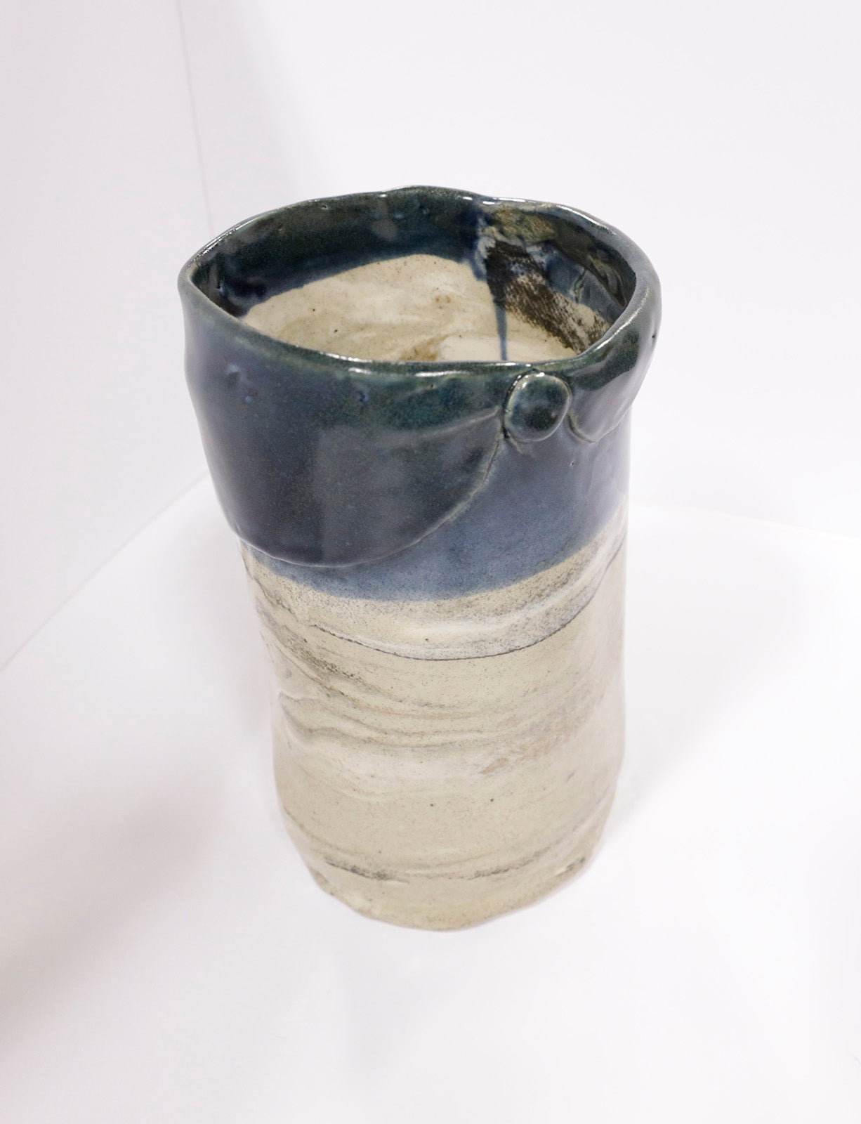 Sculpture “Indigo Blue & Cream Vase” by Dina Egar.