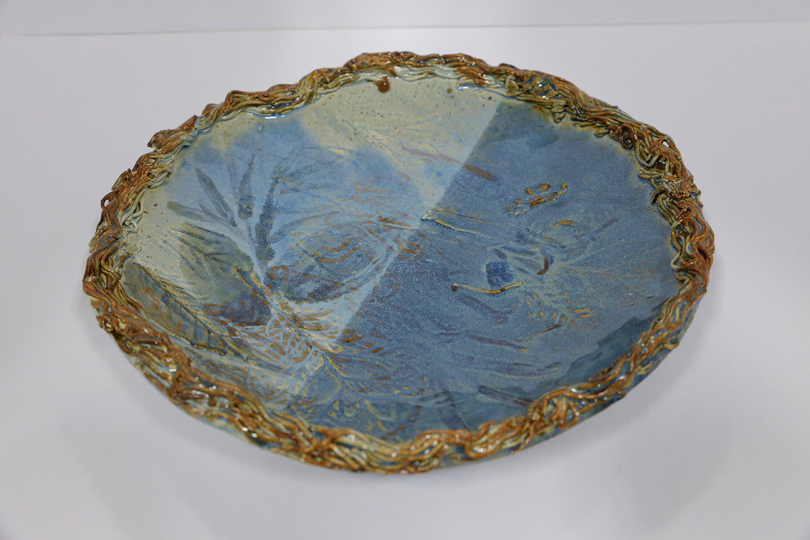 Sculpture “Blue Leaf Dish” by Dina Egar.